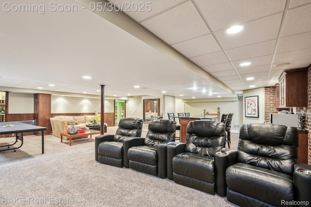 966 Mcdonald Dr, Northville, MI 48167 - carpeted home theater room featuring bar area, recessed lighting, a drop ceiling, and wooden walls
