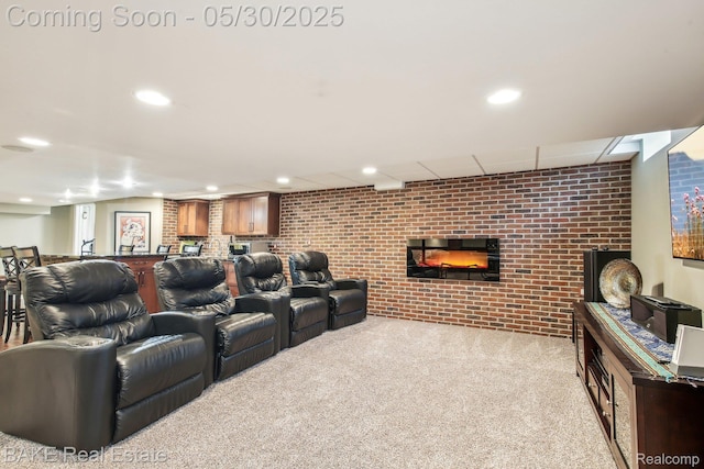 966 Mcdonald Dr, Northville, MI 48167 - carpeted home theater room featuring brick wall and recessed lighting