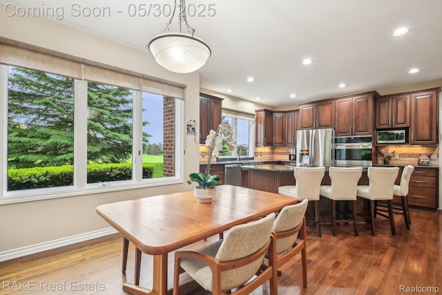 966 Mcdonald Dr, Northville, MI 48167 - dining room with wood finished floors, recessed lighting, and baseboards