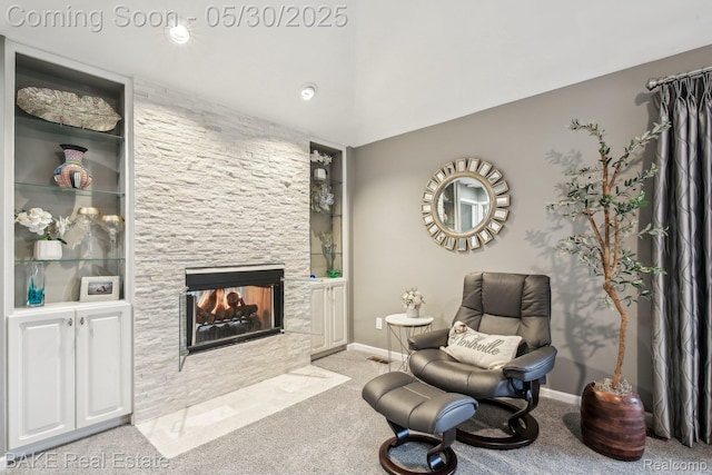 966 Mcdonald Dr, Northville, MI 48167 - sitting room featuring carpet, a multi sided fireplace, baseboards, and built in shelves