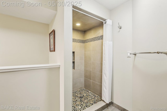966 Mcdonald Dr, Northville, MI 48167 - bathroom featuring a stall shower and baseboards