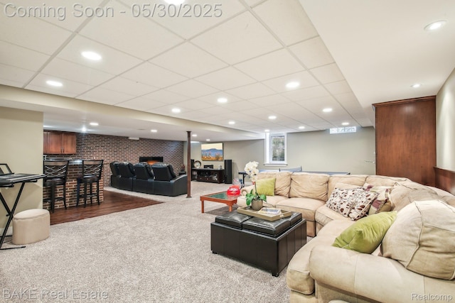 966 Mcdonald Dr, Northville, MI 48167 - carpeted living room featuring bar area, recessed lighting, and a fireplace