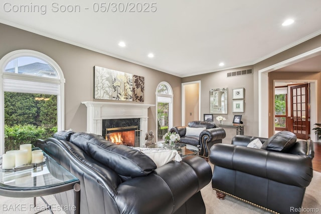 966 Mcdonald Dr, Northville, MI 48167 - living room featuring a fireplace, crown molding, recessed lighting, and light colored carpet