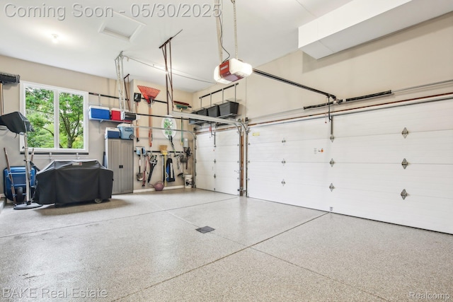 966 Mcdonald Dr, Northville, MI 48167 - garage featuring a garage door opener