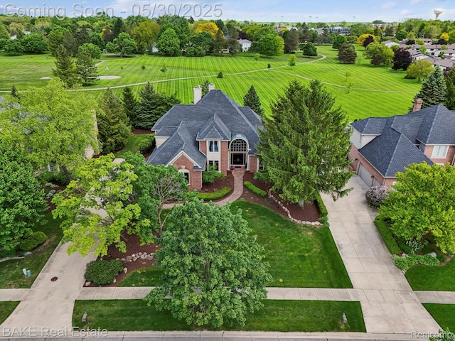 966 Mcdonald Dr, Northville, MI 48167 - view of subject property with a tree filled landscape