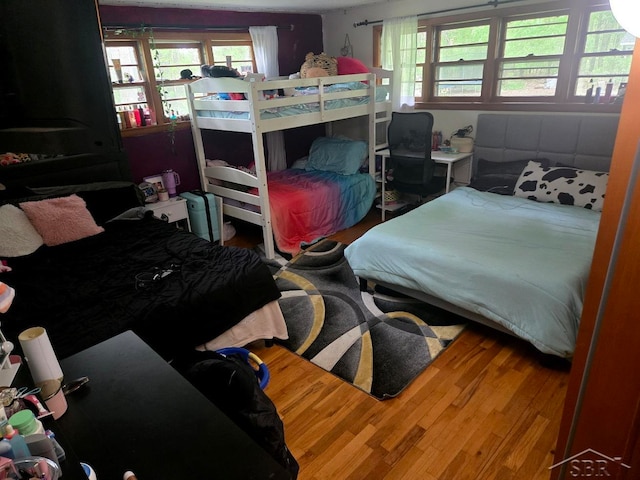 3775 N Hemlock Rd, Hemlock, MI 48626 - bedroom with wood finished floors