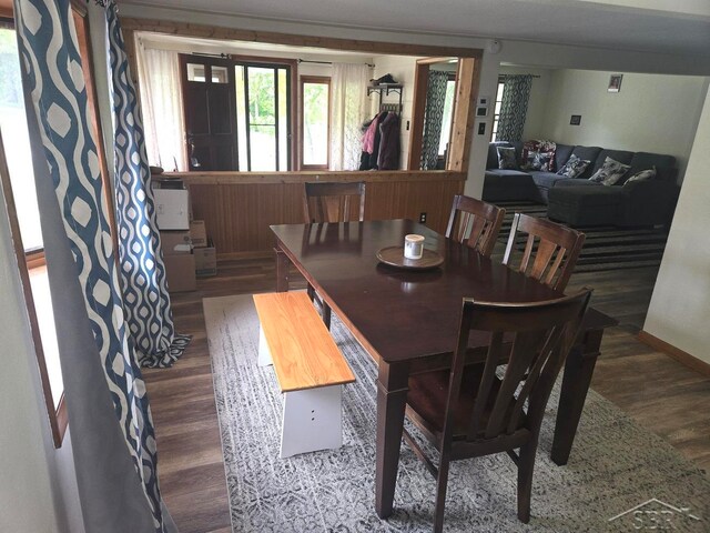 3775 N Hemlock Rd, Hemlock, MI 48626 - dining room featuring wood finished floors and baseboards