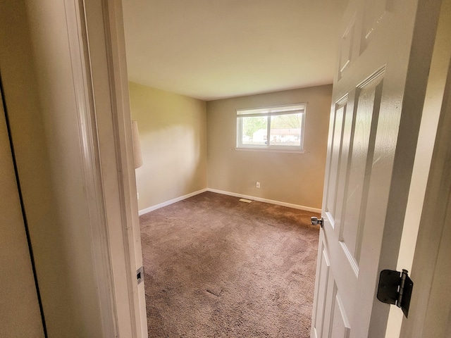 16442 Brandt St, Romulus, MI 48174 - unfurnished bedroom featuring carpet and baseboards