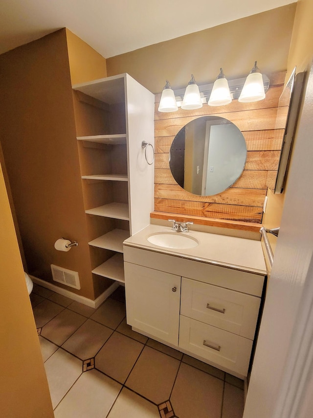 16442 Brandt St, Romulus, MI 48174 - bathroom featuring tile patterned floors, vanity, and toilet