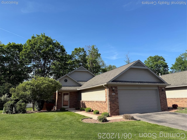 3052 Rivers Edge Dr, Wayne, MI 48184 - view of front of house featuring brick siding, a garage, a front lawn, asphalt driveway, and roof with shingles