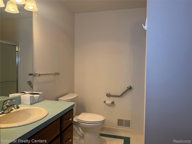 3052 Rivers Edge Dr, Wayne, MI 48184 - bathroom with tile patterned flooring, vanity, toilet, an enclosed shower, and baseboards