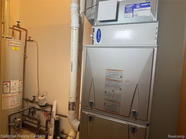 3052 Rivers Edge Dr, Wayne, MI 48184 - utility room featuring gas water heater and heating unit