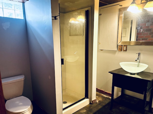 404 Pauline Blvd, Ann Arbor, MI 48103 - full bath featuring a sink, a stall shower, toilet, and baseboards
