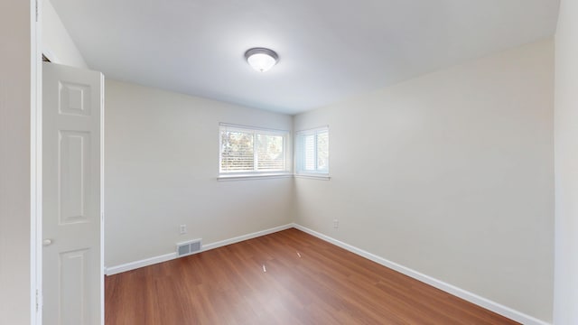 26817 Newport Ave, Warren, MI 48089 - unfurnished room featuring wood finished floors and baseboards