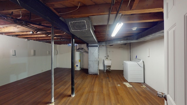 26817 Newport Ave, Warren, MI 48089 - unfinished below grade area featuring water heater, separate washer and dryer, wood finished floors, and a sink