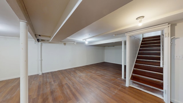 26817 Newport Ave, Warren, MI 48089 - finished basement with wood finished floors, stairs, and baseboards