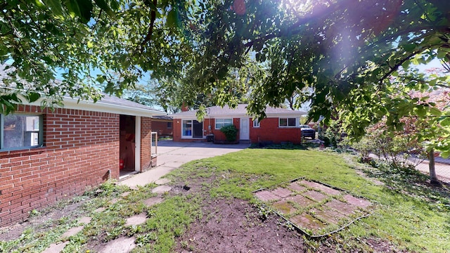 26817 Newport Ave, Warren, MI 48089 - view of green lawn with a patio area