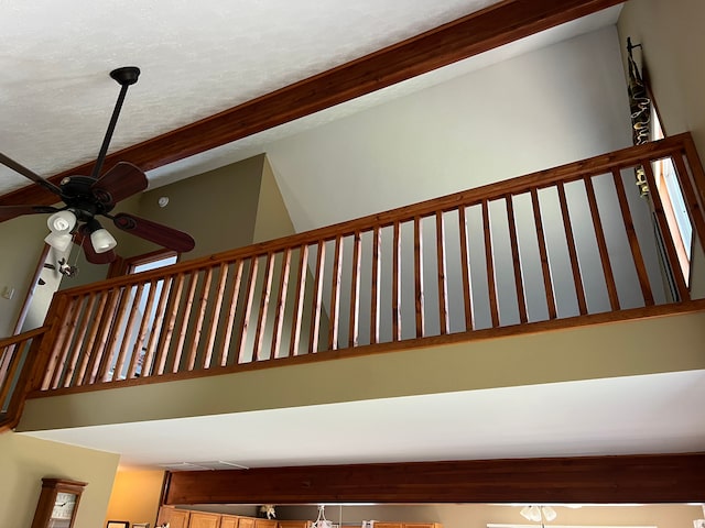 11055 Kopko Trl, Roscommon, MI 48653 - stairway with ceiling fan and a high ceiling