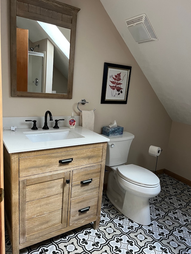 11055 Kopko Trl, Roscommon, MI 48653 - bathroom featuring lofted ceiling, vanity, toilet, and an enclosed shower