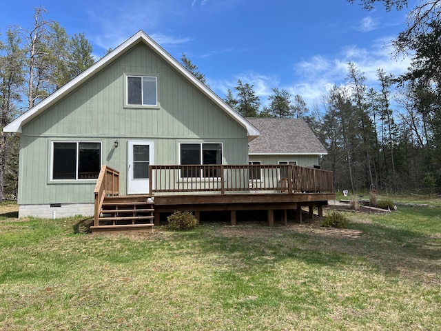 11055 Kopko Trl, Roscommon, MI 48653 - back of property featuring a deck, a yard, and crawl space