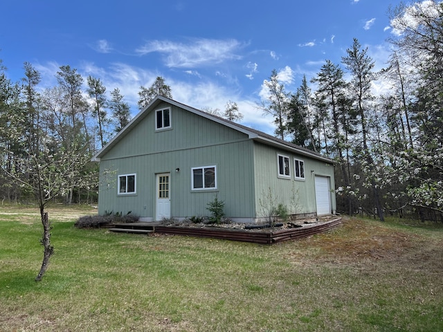 11055 Kopko Trl, Roscommon, MI 48653 - back of house with a yard