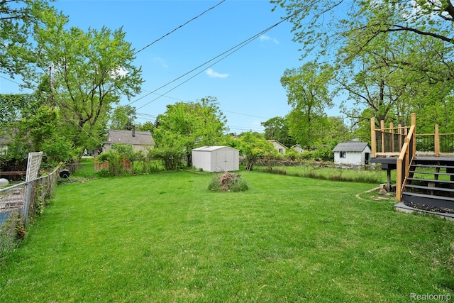 3819 Hazelett Dr, Waterford, MI 48328 - view of yard with a wooden deck