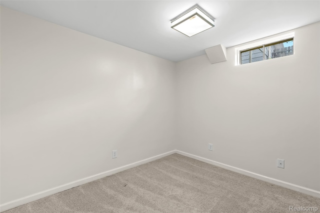 3819 Hazelett Dr, Waterford, MI 48328 - below grade area with baseboards and carpet floors