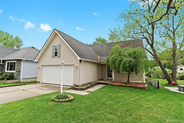 3819 Hazelett Dr, Waterford, MI 48328 - view of front of house with driveway, a garage, a front yard, and roof with shingles