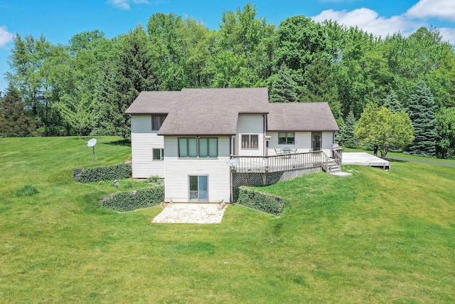 838 Able Rd, Buchanan, MI 49107 - rear view of property with a patio area, a deck, a yard, roof with shingles, and a forest view