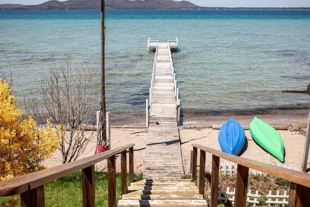 8432 S Dunns Farm Rd, Maple City, MI 49664 - dock with a water and mountain view
