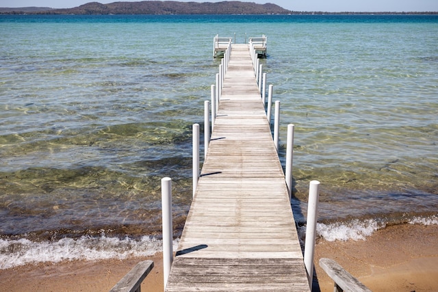 8432 S Dunns Farm Rd, Maple City, MI 49664 - dock area with a water and mountain view