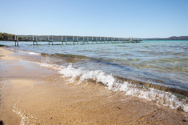 8432 S Dunns Farm Rd, Maple City, MI 49664 - water view featuring nearby beach