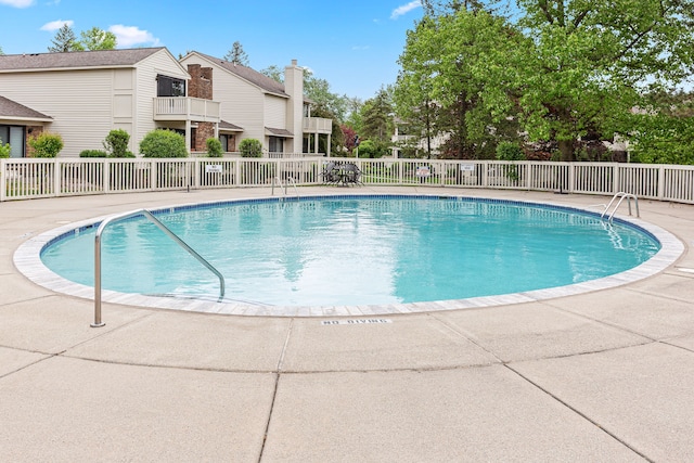 community pool featuring a patio
