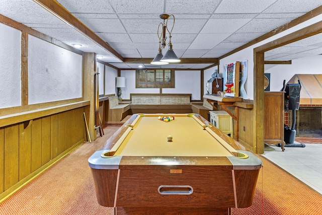 playroom with billiards, carpet floors, wood walls, and a wainscoted wall