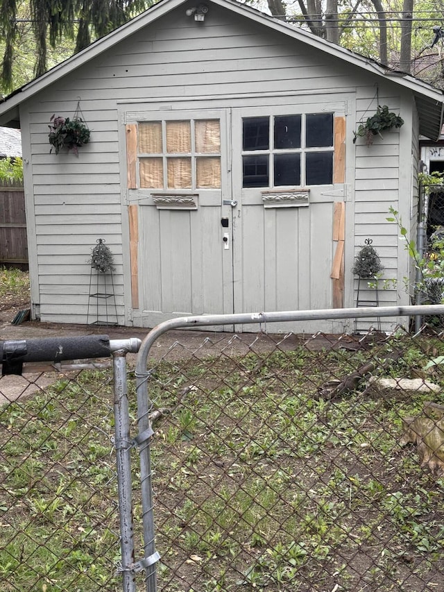 8100 Stockton St, Detroit, MI 48234 - back of property featuring fence and an outdoor structure