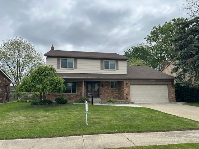 view of front of property featuring brick siding, a garage, driveway, and a front lawn