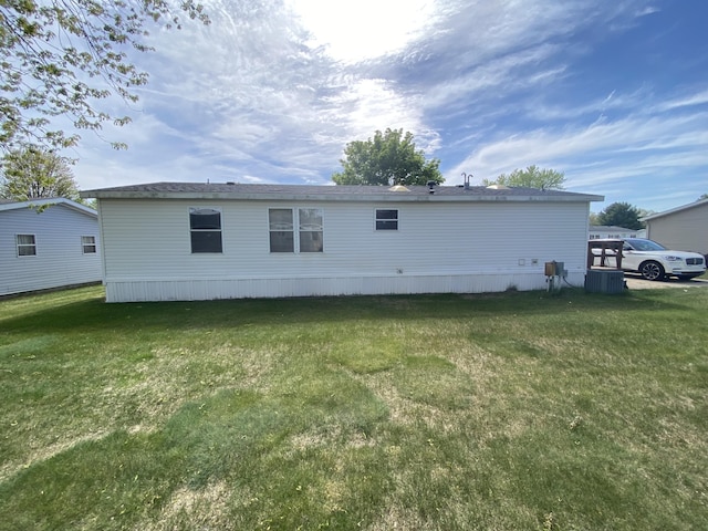 1966 Spyglass Trl, Muskegon, MI 49442 - rear view of house with a yard