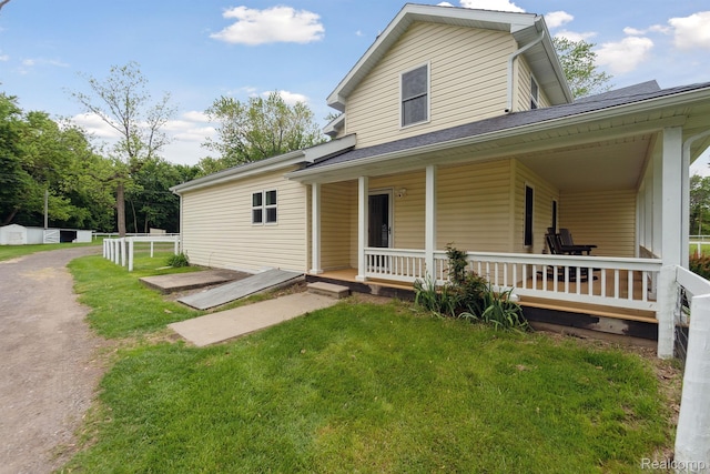 5160 N Milford Rd, Highland, MI 48356 - farmhouse inspired home featuring a front lawn and covered porch