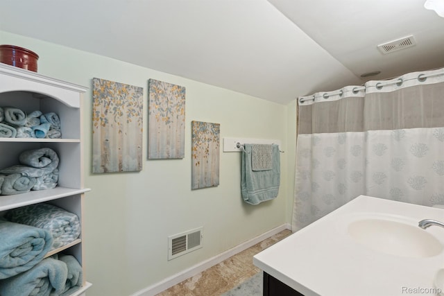 5160 N Milford Rd, Highland, MI 48356 - full bathroom featuring vaulted ceiling, vanity, baseboards, and a shower with shower curtain