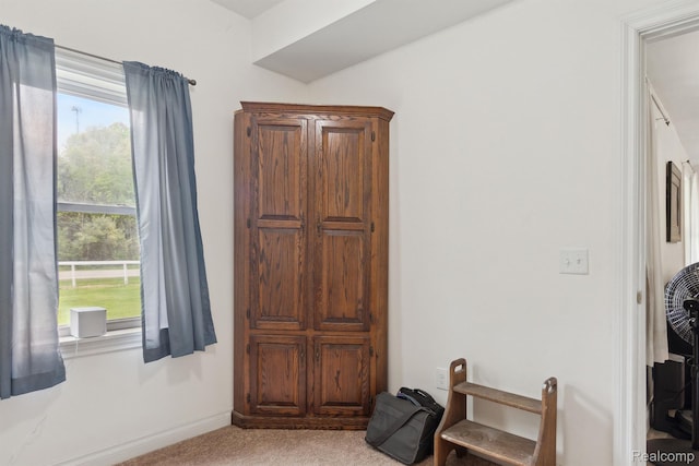 5160 N Milford Rd, Highland, MI 48356 - living area with light carpet and baseboards