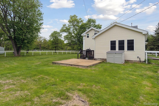 5160 N Milford Rd, Highland, MI 48356 - rear view of house with a wooden deck