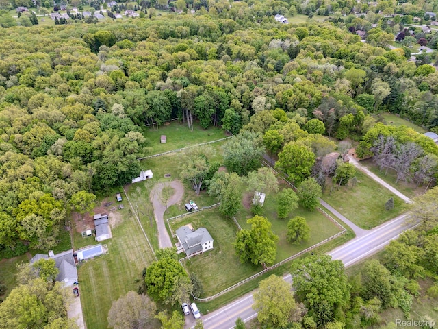 5160 N Milford Rd, Highland, MI 48356 - aerial view of property's location with a heavily wooded area