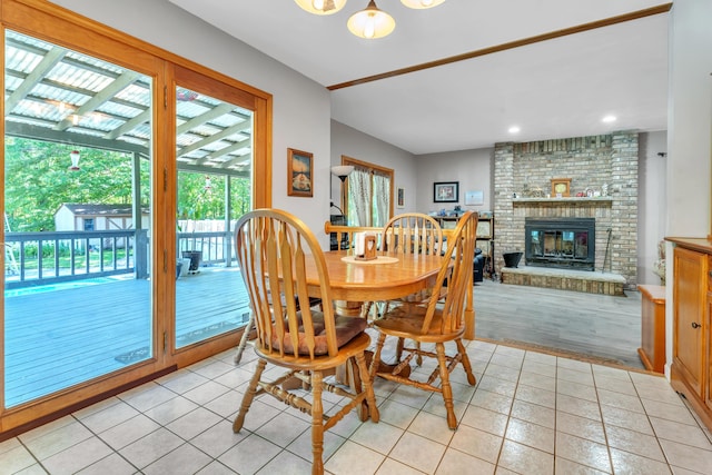 65505 M 43, Bangor, MI 49013 - dining area featuring a brick fireplace, light tile patterned floors, and recessed lighting