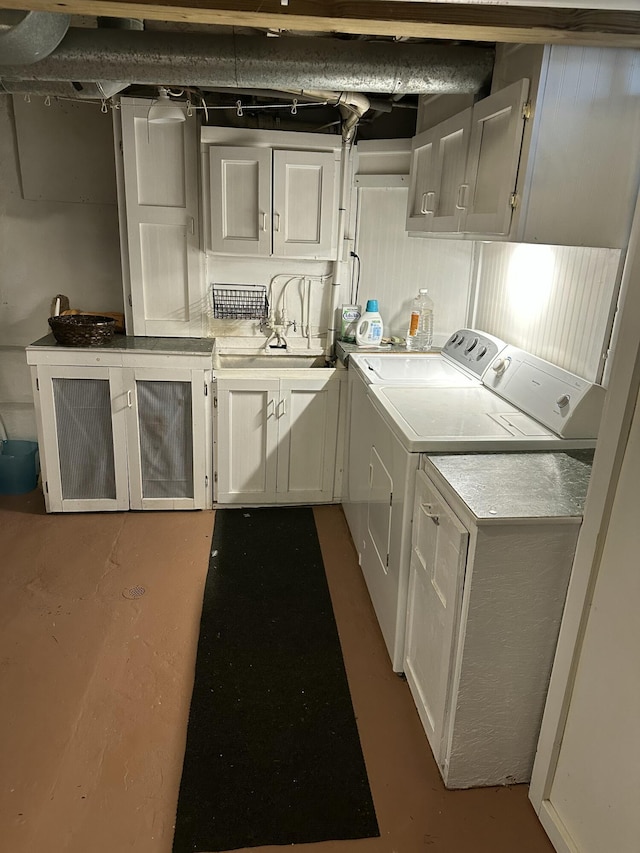 laundry area with cabinet space and washer and clothes dryer