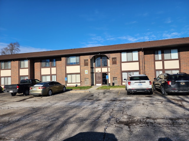 4925 E 10 Mile Rd Unit 5, Warren, MI 48091 - view of building exterior featuring uncovered parking