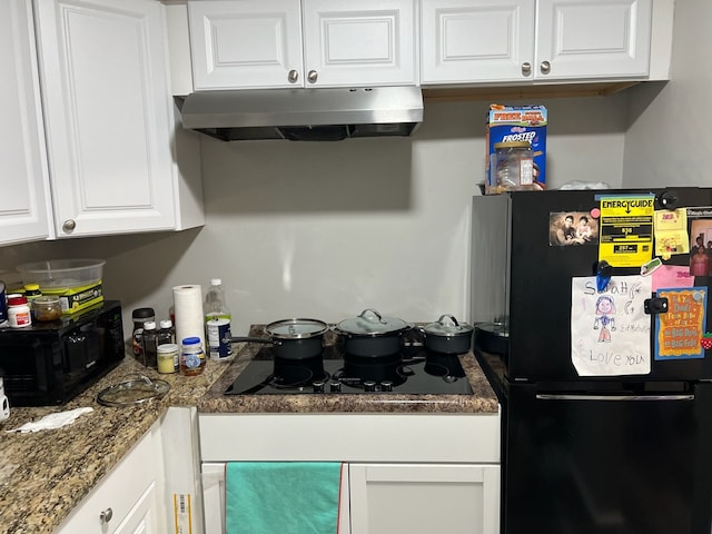 4925 E 10 Mile Rd Unit 5, Warren, MI 48091 - kitchen with black appliances, under cabinet range hood, and white cabinetry