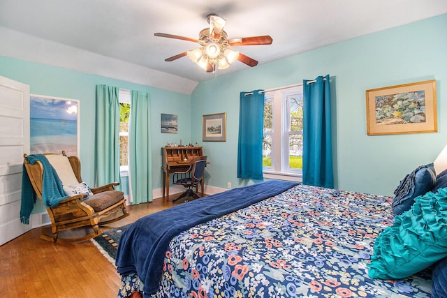 488 4th St, Manistee, MI 49660 - bedroom featuring wood-type flooring and ceiling fan