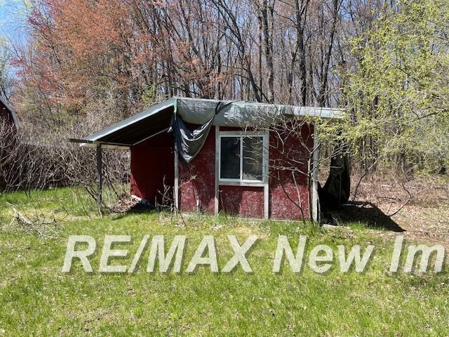 1944 S M 18 Hwy, Gladwin, MI 48624 - view of outbuilding