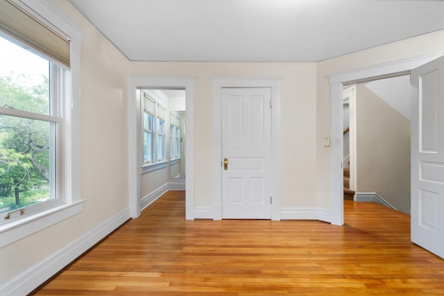 1054 Ferdon Rd, Ann Arbor, MI 48104 - unfurnished bedroom featuring light wood-type flooring and baseboards