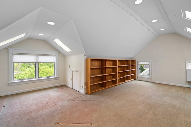 1054 Ferdon Rd, Ann Arbor, MI 48104 - additional living space featuring a skylight, vaulted ceiling, baseboards, recessed lighting, and carpet flooring